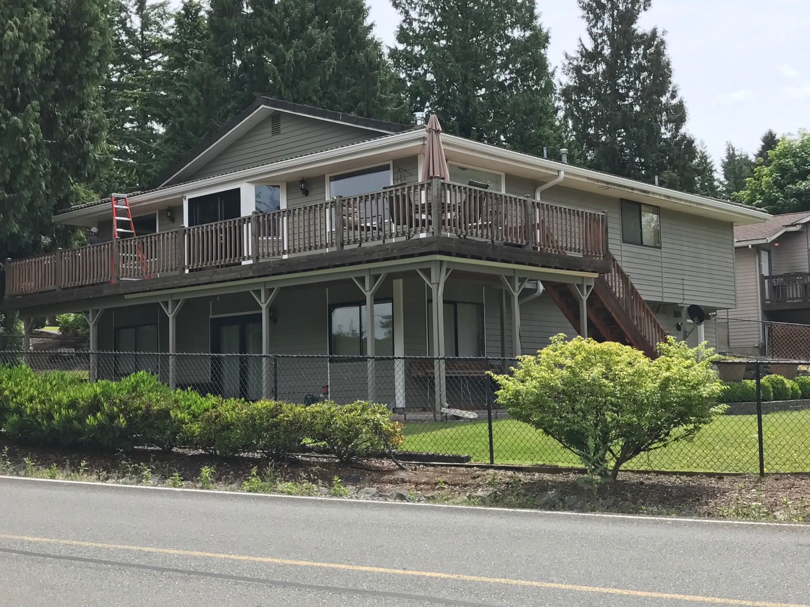 Home with completed exterior gutter work